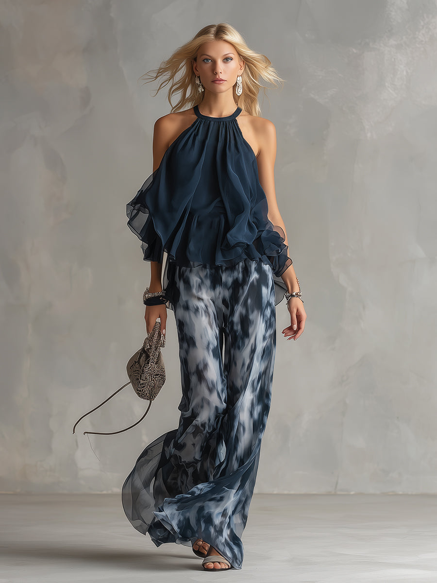 Olivia – Elegant chiffon set with high-neck top and wide-leg printed trousers