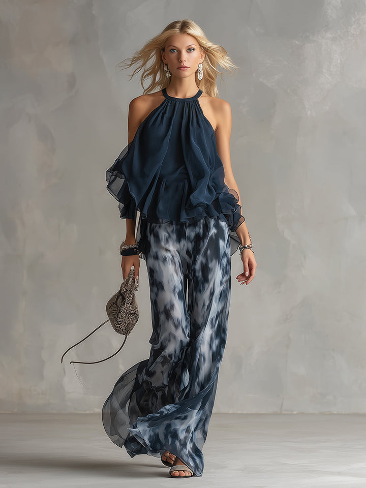 Olivia – Elegant chiffon set with high-neck top and wide-leg printed trousers