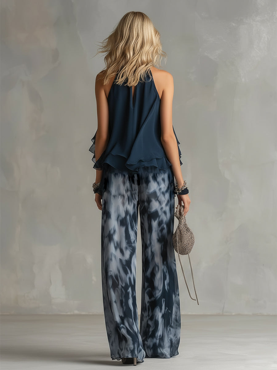 Olivia – Elegant chiffon set with high-neck top and wide-leg printed trousers