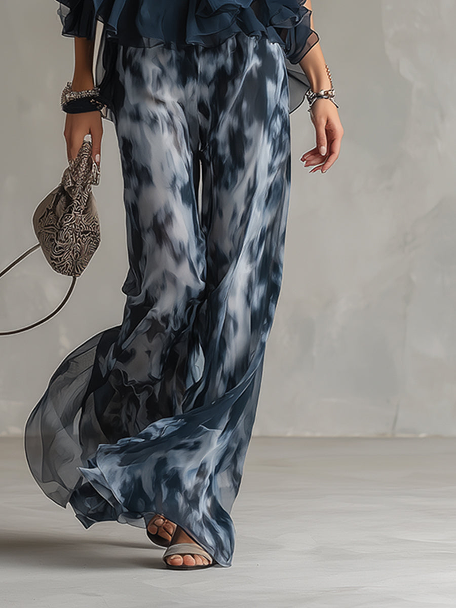 Olivia – Elegant chiffon set with high-neck top and wide-leg printed trousers