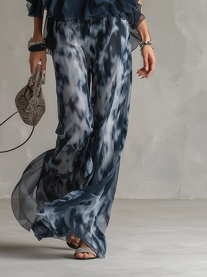 Olivia – Elegant chiffon set with high-neck top and wide-leg printed trousers